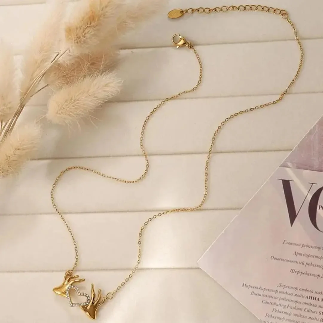Collier Double Cœur Doré - Image 3